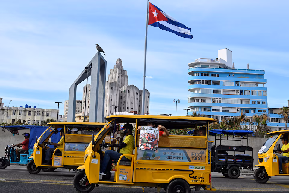 Cubans take to the streets on bikes to voice their opposition to US sanctions